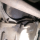 Looking almost directly upward, toward the passenger side of the pan. Huge transmission bracket in the way.